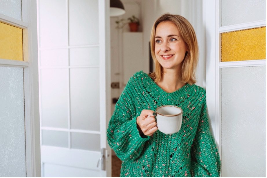 A person holding a cup