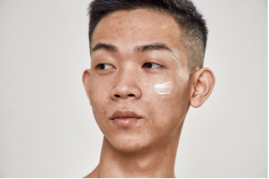 A person with a cream on his face